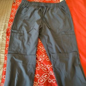 2 pairs of scrubs, size M